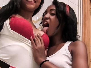 Attractive Ebony Lesbians Lick and Suck Tits