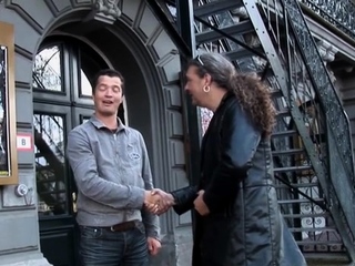 Darksome hooker provides white fellow a steaming oral sex