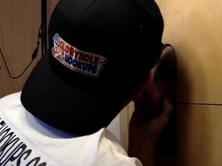 Gloryhole lover eagerly milking dicks by means of the wall