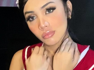 Tranny with large tits tugs on her large cock