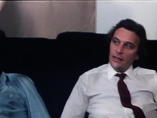 The brunette with major boobs does a hand job and blowjob