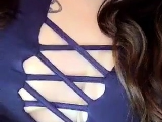 Busty curly brunette with massive boobs fucks on couch