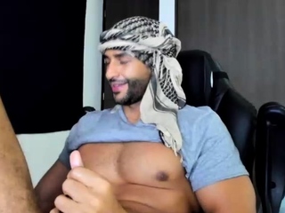 Gay latin stud jerks off his cock till he cums