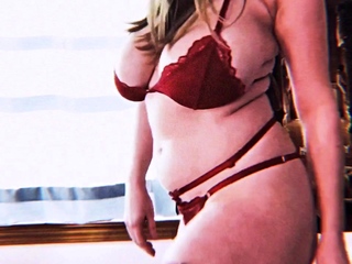 Busty curly brunette with massive boobs fucks on couch