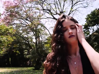 Beautiful all all-natural model outside strip