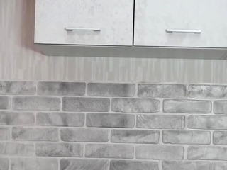 Busty babe playing with her huge boobs