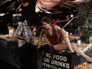 Busty brunette sucks and licks large cock in a close up