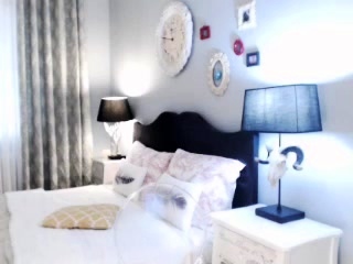 Busty curly brunette with huge boobs fucks on couch