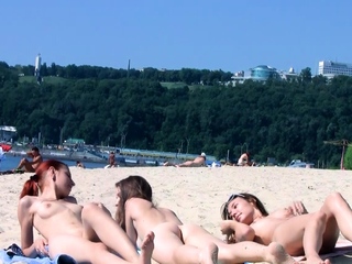 Attractive nudist teen enjoys