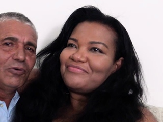 Pink labia close up of naive brunette playing with her name