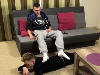 Gay teen provides socked footjob