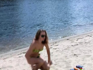 Young nudist babes secretly filmed by a voyeur getting exciting