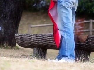 A younger homosexual having  wank in public