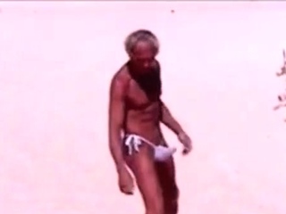 Tanned man on seaside in tiny string thong (quickly!)