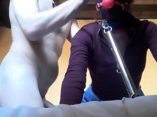 tied, blinfolded and ball gagged then has to suck a giant cock