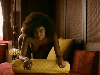 Curly ebony mannequin reveals excellent physique