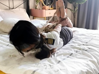 chinese language hogtie on mattress