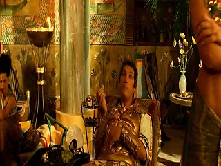 Monica Bellucci exhibiting some beautiful cleavage dressed as