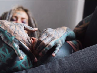 Gorgeous tattooed girl fucks her ass with a big dildo