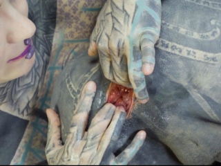 Inked babe Anuskatzz fists Lily Lus ass